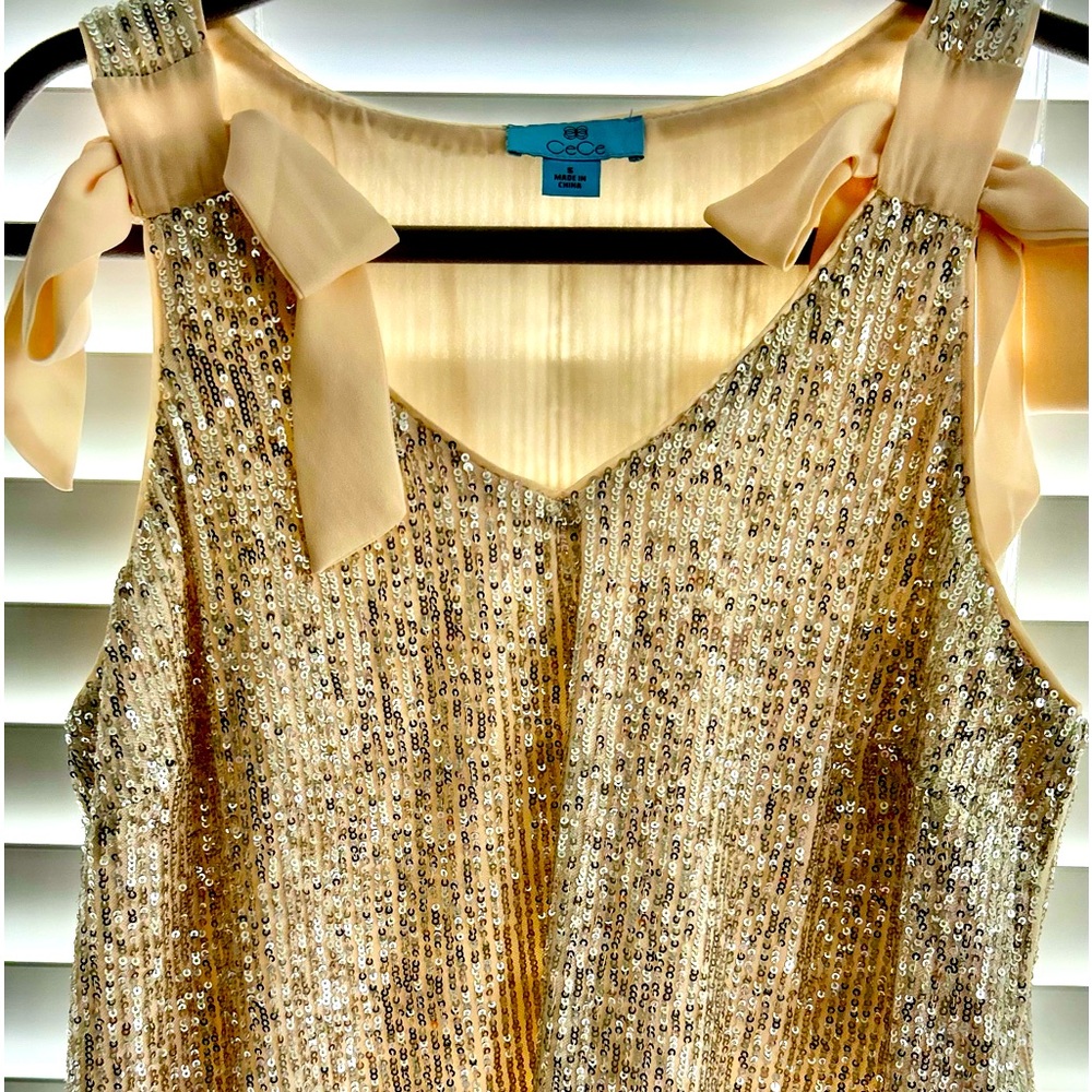 Cece sequin top with bow shoulders. Size small